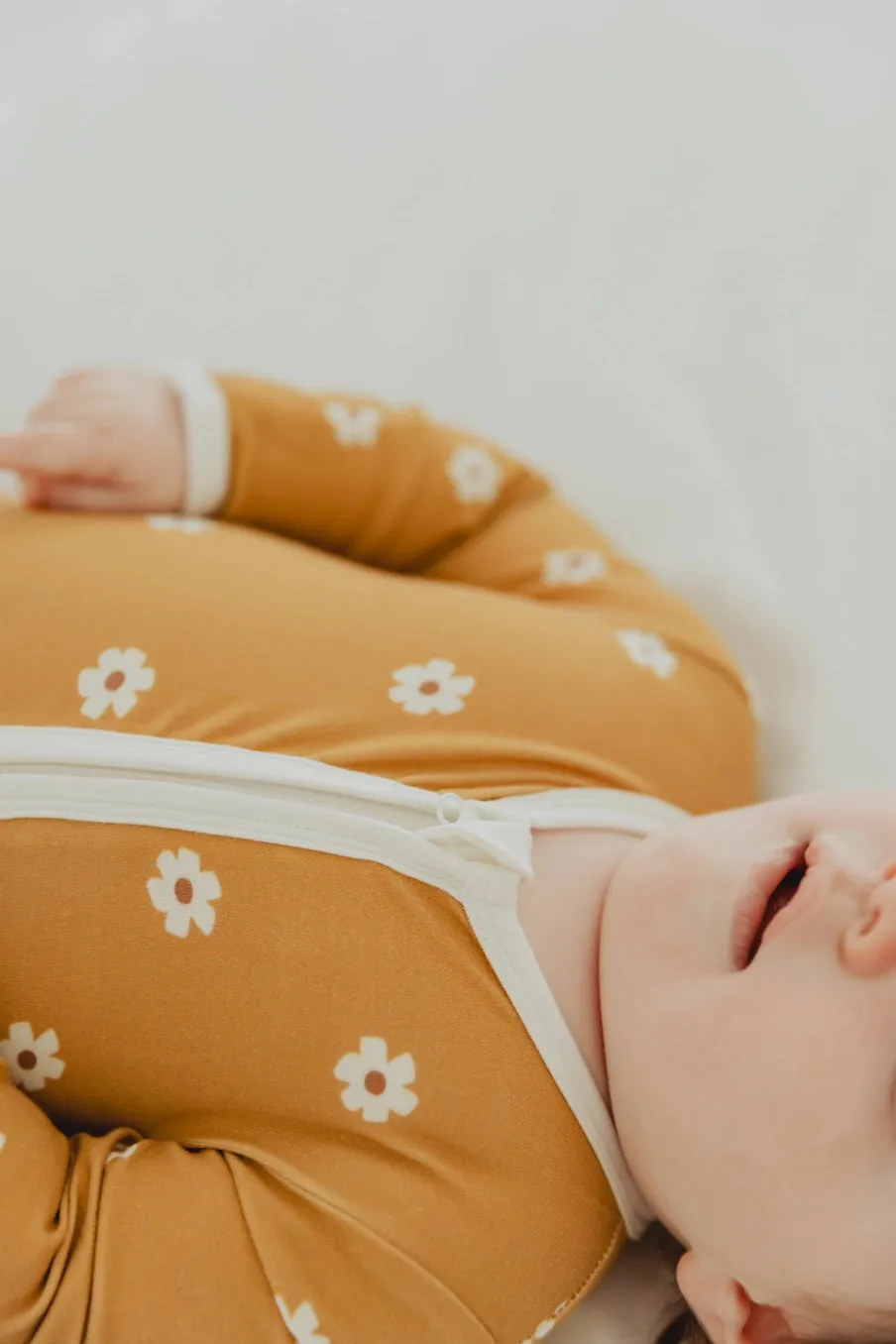 Mustard Floral Baby Footie Romper