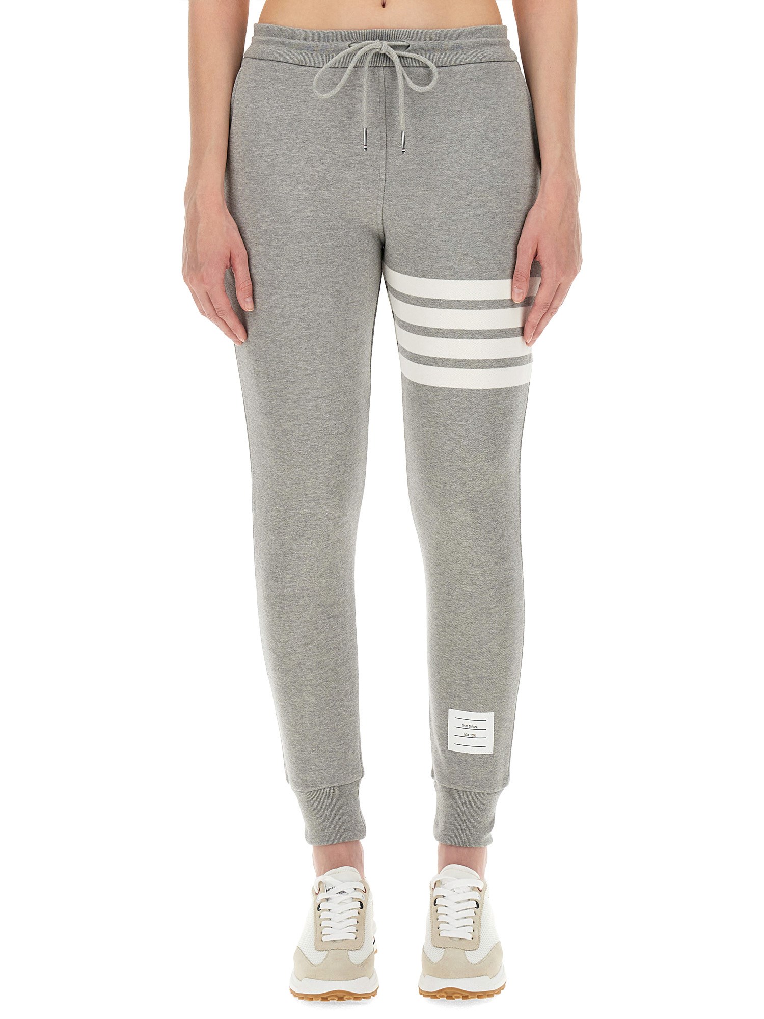 THOM BROWNE    COTTON FLEECE PANTS WITH STRIPED DETAIL