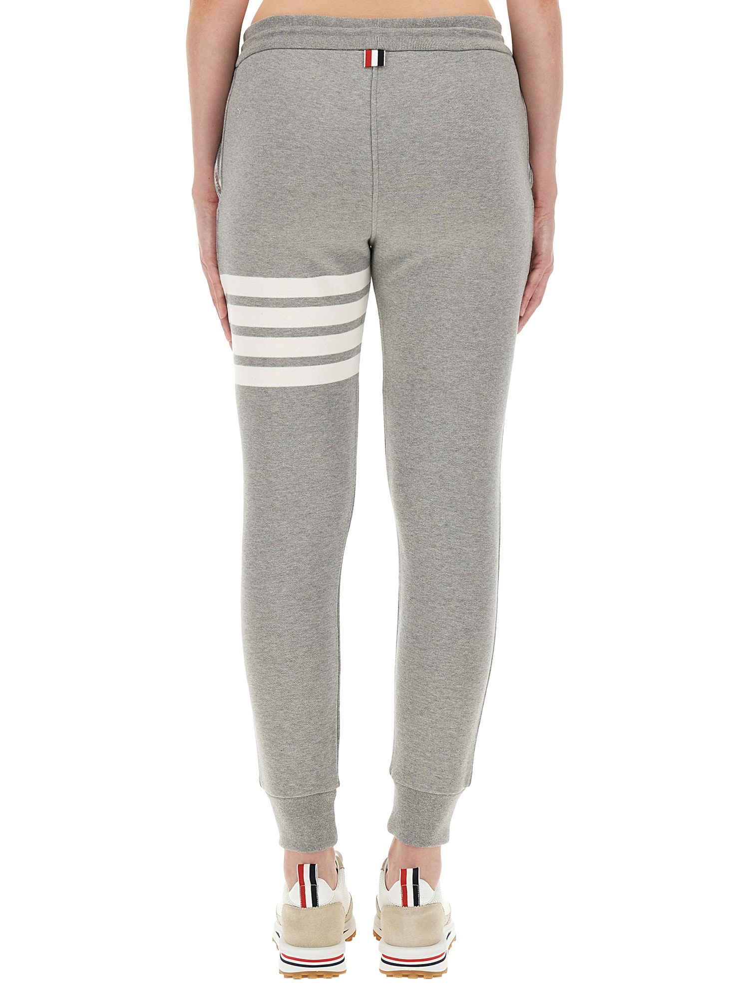 THOM BROWNE    COTTON FLEECE PANTS WITH STRIPED DETAIL